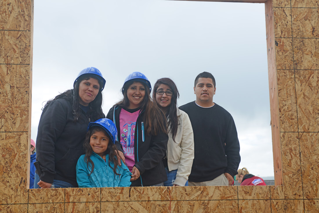 The Ruiz family at their solar-powered home